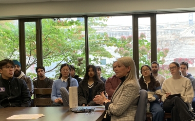 presenter speaking with students